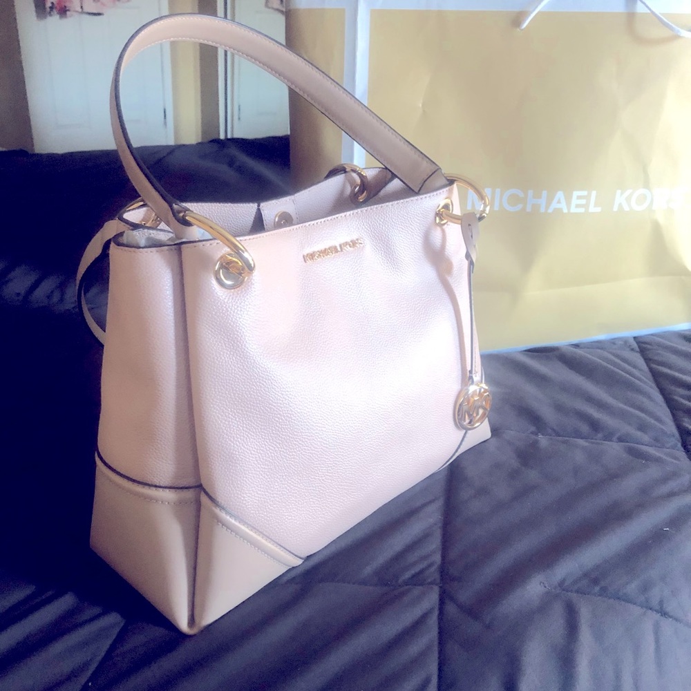 Michael Kors purse in a blush pink